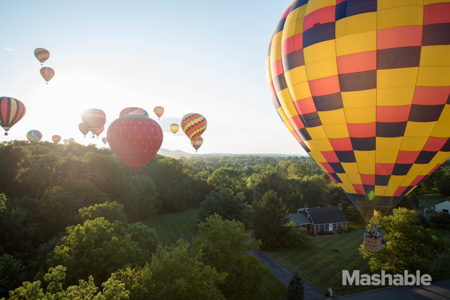 An aerial view of a hot air balloon festival